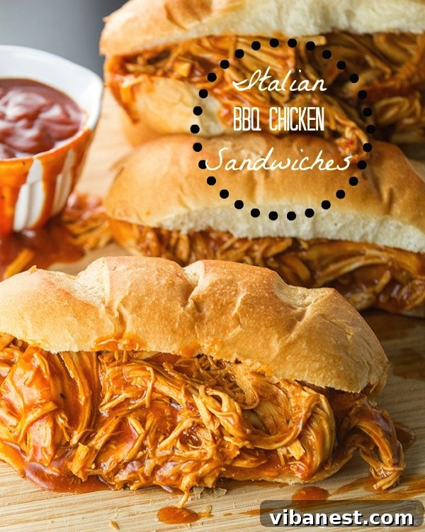 Italian BBQ Chicken Sandwiches close-up Close-up of shredded Italian BBQ chicken in a bun with fresh toppings