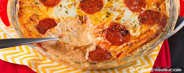 Garnished Pizza Dip A beautifully presented pizza dip, garnished and ready for a party.