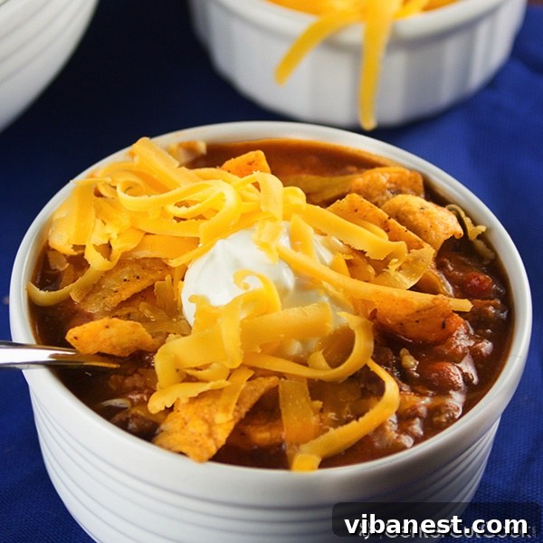 Slow cooker chili in a pot. A large pot of slow cooker chili ready to be scooped into bowls.