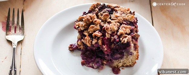 Berry Crumble Cake Slice Slice of Berry Crumble Cake on a Plate