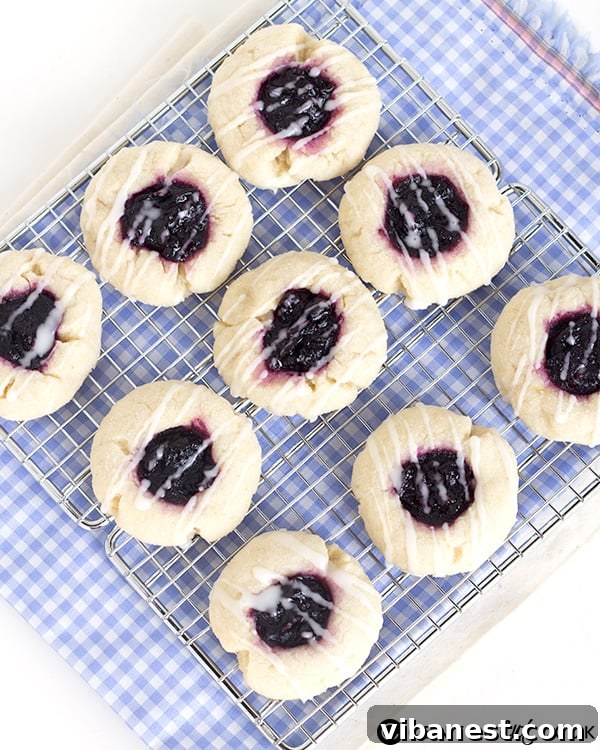 blueberry-lemon-thumbprint-cookies-3.jpg Unbaked Blueberry Lemon Thumbprint Cookies with jam filling, ready for the oven
