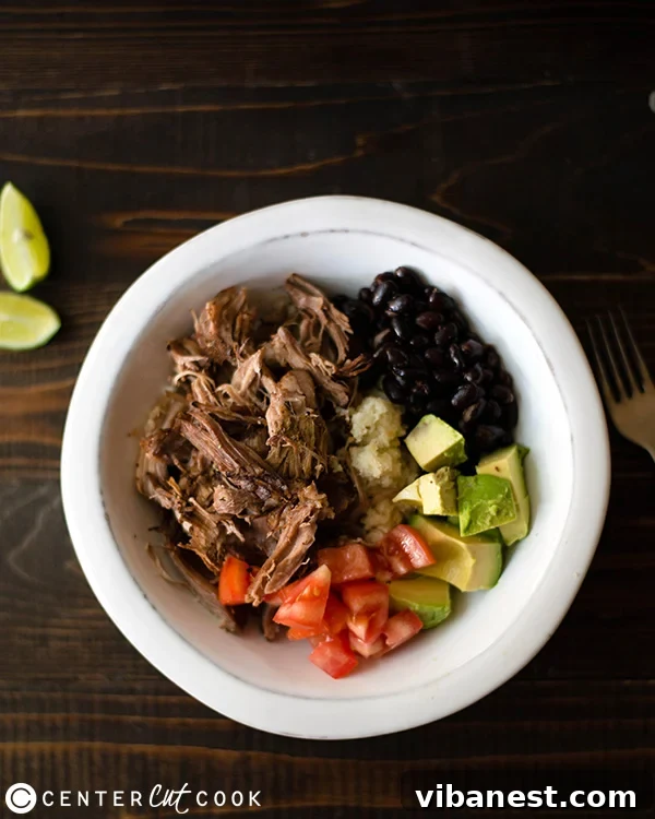Crispy Carnitas Prep Shredded pork shoulder ready for broiling to make crispy carnitas