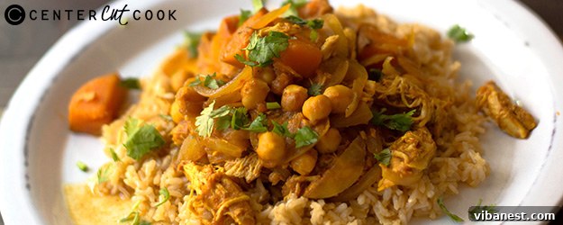 Delicious slow cooker chicken curry featuring tender chicken, sweet potatoes, and chickpeas in a creamy coconut sauce.