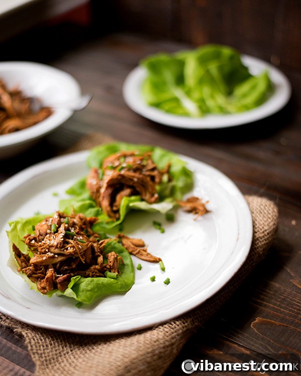 Slow Cooker Sesame Chicken Wraps, serving suggestion over rice