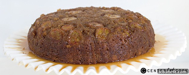 Beautifully caramelized banana slices forming the topping of an upside down skillet cake, glistening with a rich golden brown syrup.