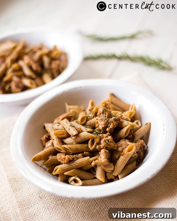 Chicken Sausage Pasta Meal Serving of healthy chicken sausage pasta in a rustic bowl