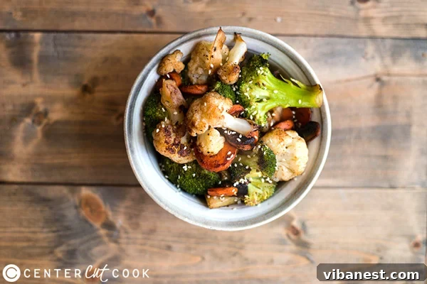 Vibrant Sautéed Vegetable Medley A colorful medley of freshly sautéed vegetables, featuring broccoli, cauliflower, and carrots, ready to be served as a healthy side dish.