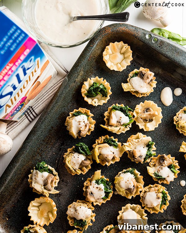Savory Vegan Fillo Bites Close-up of baked vegan pie bites ready to serve, showcasing their golden crust and savory filling