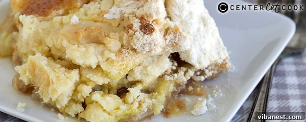 Delicious single slice of pear dump cake A close-up shot of a single slice of pear dump cake, showing the fruit filling and crispy topping.