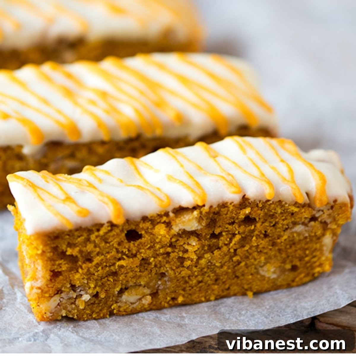 Pumpkin Spice Blondie Sticks 4 Various pumpkin blondie fingers arranged on a cooling rack
