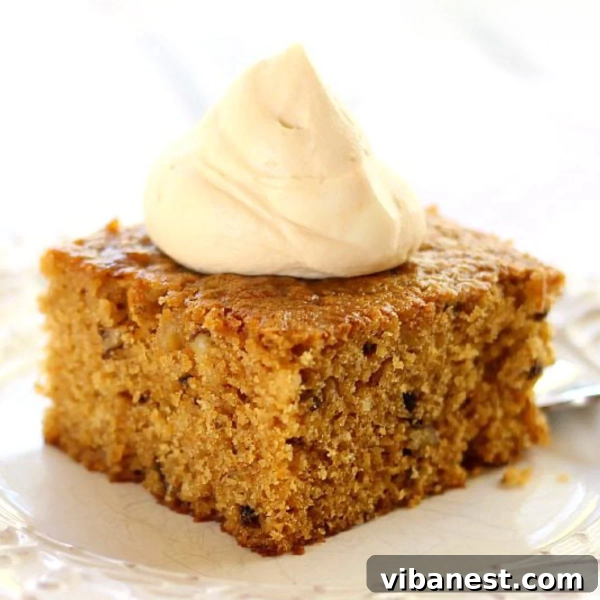 Caramel Crowned Pumpkin Walnut Delight 2 Delicious slice of pumpkin walnut cake topped with creamy caramel whipped cream