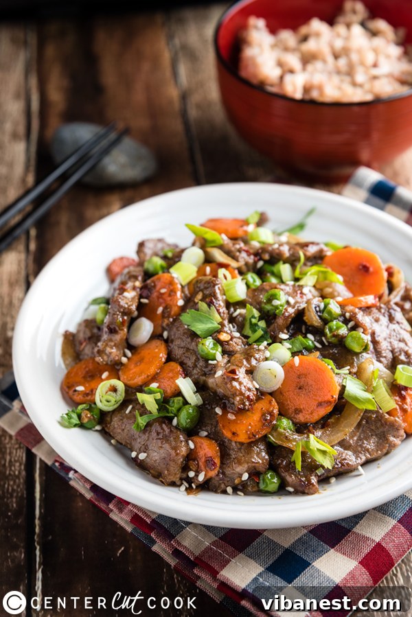Achieving tender beef stir fry at home Cumin Beef Stir Fry cooking process showing tender meat on a skillet