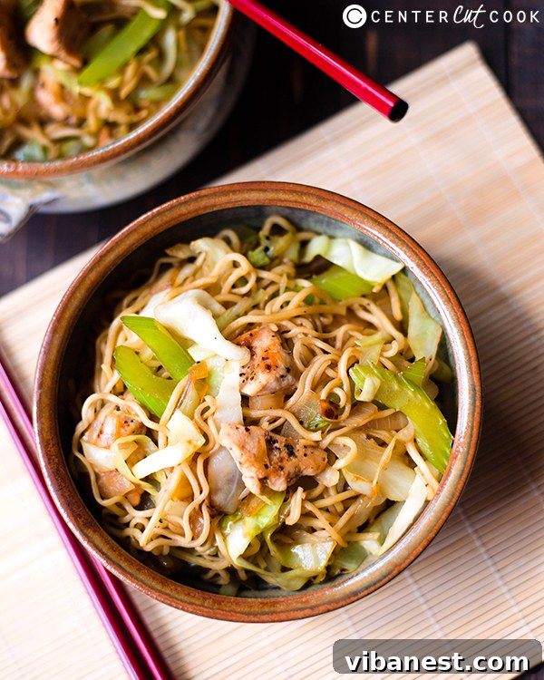 Freshly prepared Chicken Chow Mein Close-up of freshly cooked chicken chow mein noodles with chicken and vegetables