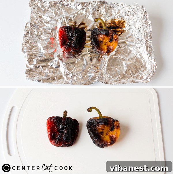 Charring Bell Peppers Under the Broiler Bell peppers actively charring and blackening under a hot broiler
