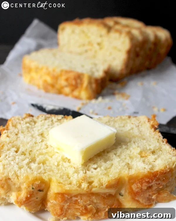 garlic-cheese-bread-dough.jpg Close-up of the thick, flavorful dough for quick garlic cheese bread, showing its rich texture before baking.
