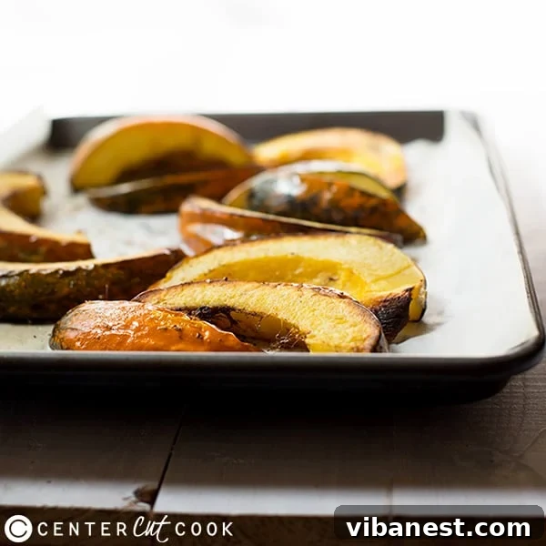 Delicious Roasted Acorn Squash in a Bowl A bowl of freshly roasted acorn squash, perfectly browned and seasoned, ready to be served