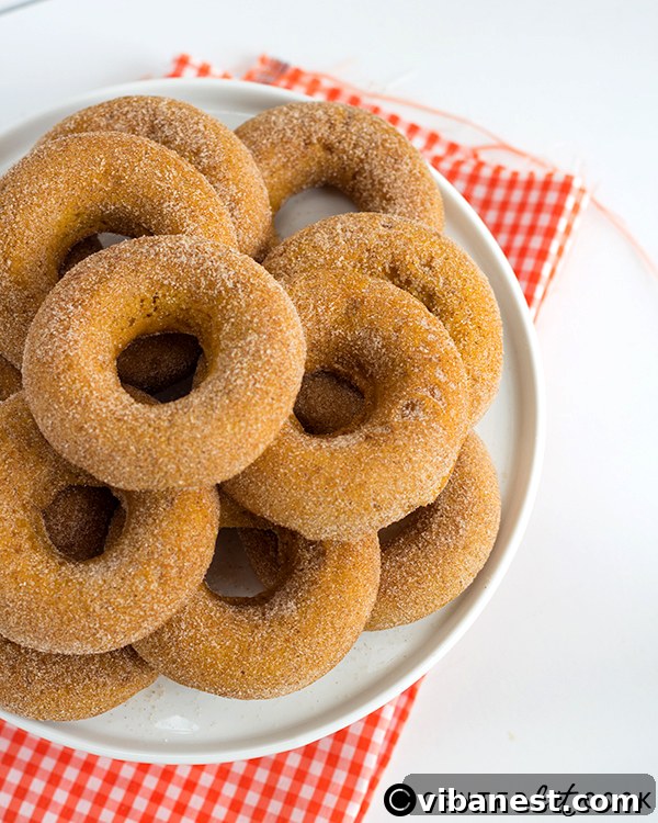Pumpkin Donuts Topping Freshly baked pumpkin donuts ready for topping