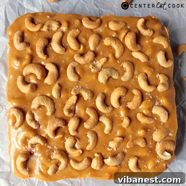 Gooey Caramel Cashew Bars Close-up of freshly baked Caramel Cashew Bars showcasing the gooey caramel and whole cashews