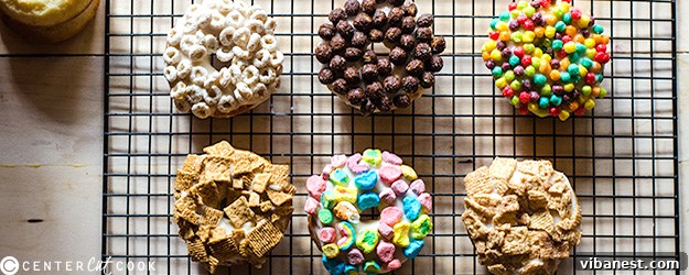 Delicious baked cereal milk donuts with glaze and cereal topping