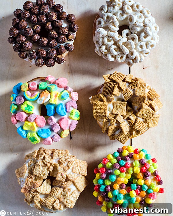 Close-up of baked cereal milk donuts with a rich glaze and crunchy cereal