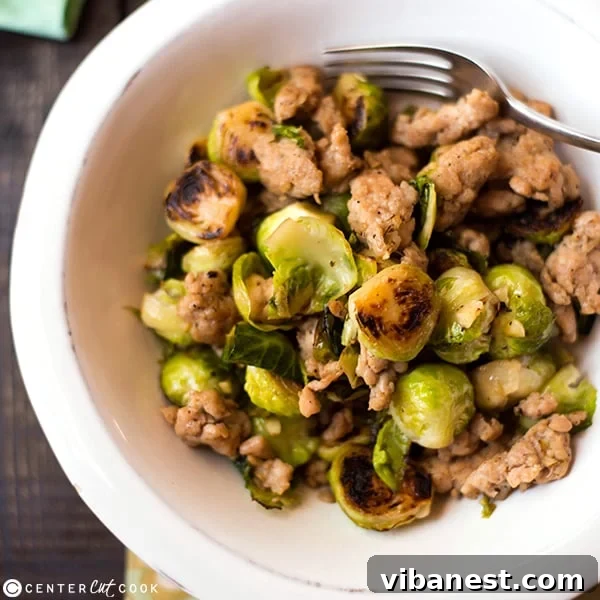 Delicious One-Pan Meal Ready in 30 Minutes cooked one pan chicken italian sausage and brussels sprouts ready to serve