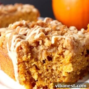A delicious slice of dairy free pumpkin coffee cake with glaze