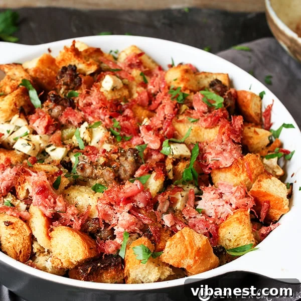 Baked Thanksgiving Sausage, Ham, and Apple Stuffing, ready to serve
