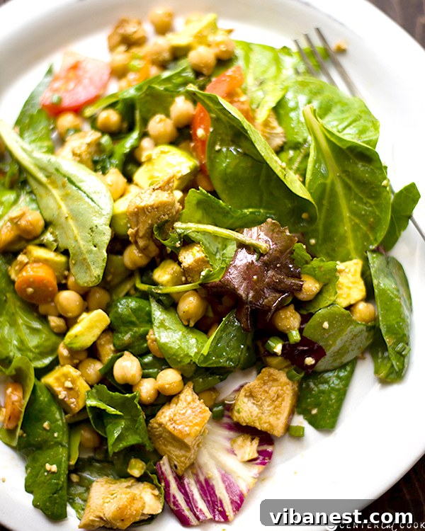 Fresh Balsamic Chicken Salad Close-up of fresh Balsamic Chicken Salad with vibrant greens, tomatoes, and chicken pieces
