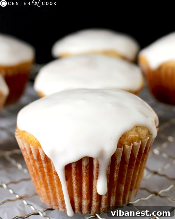 eggnog_muffins2.jpg A close-up shot of eggnog muffins baking in a muffin tin, showing their golden tops
