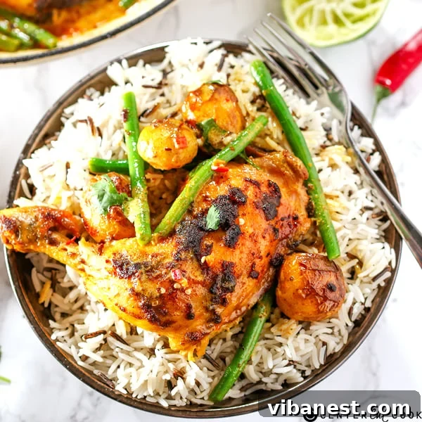 Curry Roast Chicken ready to be served, garnished with fresh cilantro