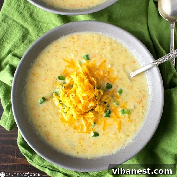 A freshly prepared bowl of Lightened-Up Broccoli Ranch Cheese Soup, featuring vibrant colors and creamy texture, ready to be served.