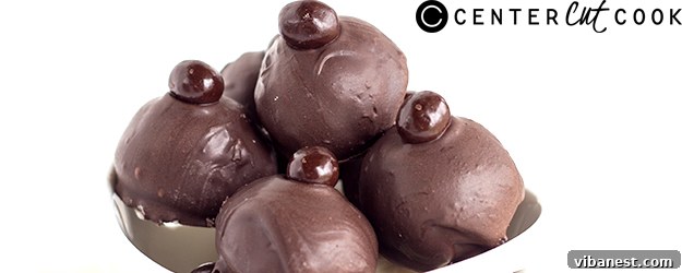Beautifully arranged homemade Eggnog Latte Truffles on a festive platter, topped with espresso beans.