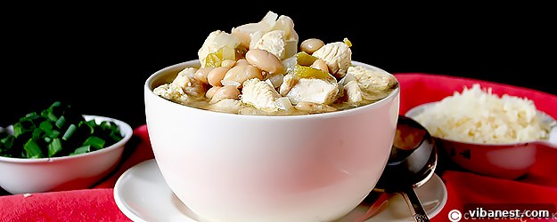 Delicious White Chicken Chili served in a bowl, garnished with fresh cilantro and a dollop of sour cream