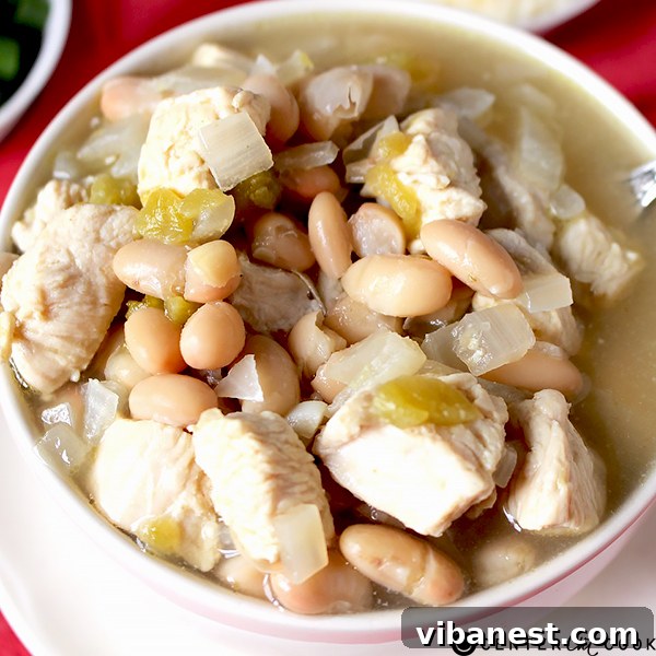 white chicken chili 3 A warm pot of White Chicken Chili simmering, ready to be served