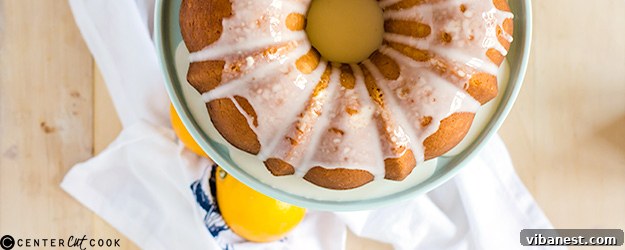 Golden Iced Meyer Lemon Pound Cake on a white plate