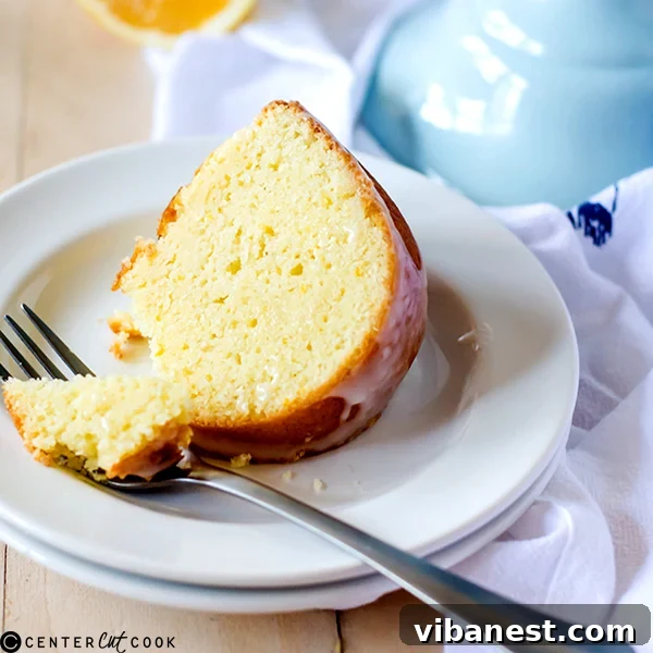 Meyer Lemon Pound Cake on Cooling Rack Meyer Lemon Pound Cake ready for serving with drizzled icing