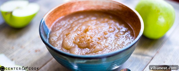 Freshly made slow cooker applesauce in a bowl, ready to be served