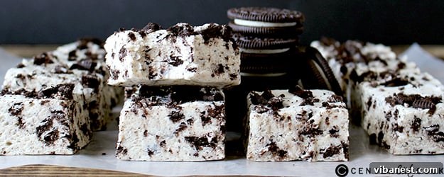 Decadent Oreo Cheesecake Fudge 5 Close-up of a stack of Oreo Cheesecake Fudge squares on a marble surface