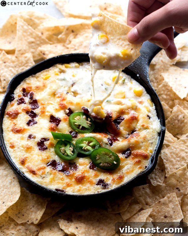 cheesy-bacon-jalapeno-corn-dip-2.jpg cheesy bacon jalapeno corn dip ready to serve
