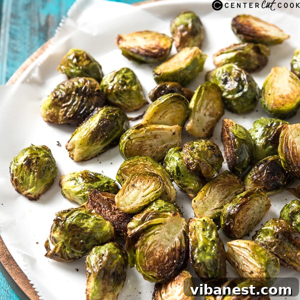 roasted-brussels-sprouts-3.jpg finished roasted brussels sprouts in a bowl