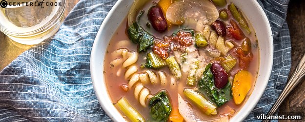 A comforting bowl of slow cooker minestrone soup with fresh vegetables and pasta