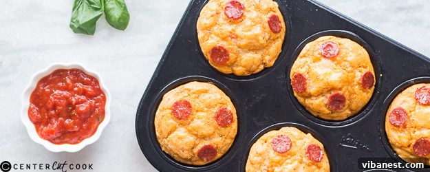 pepperoni-cheese-pizza-muffins-1.jpg Delightful pepperoni and cheese pizza muffins arranged on a serving plate