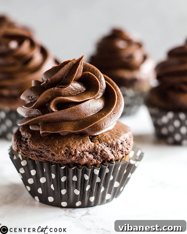 Close-up of a Chocolate Cheesecake Cupcake revealing its luscious filling