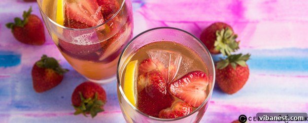 Vibrant homemade strawberry punch in a glass