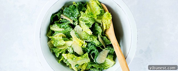 Delicious homemade Caesar dressing in a glass jar, ready to serve