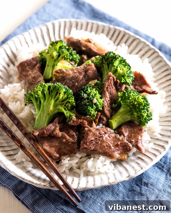Slow cooker beef and broccoli simmering with sauce