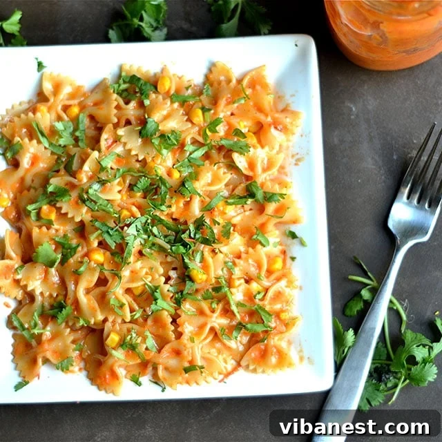Final presentation of the vibrant Roasted Red Pepper Pasta Salad