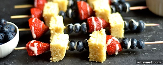 Delicious Blueberry Strawberry Shortcake Kabobs on a platter