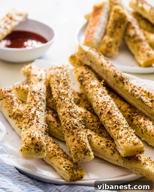 Freshly baked Pizza Hut copycat breadsticks with a golden crust