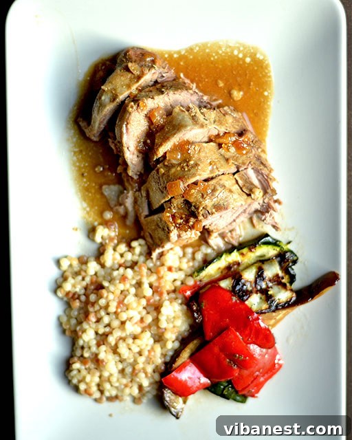 Slow Cooker Pork Tenderloin Slices Close-up of perfectly cooked slow cooker pork tenderloin slices